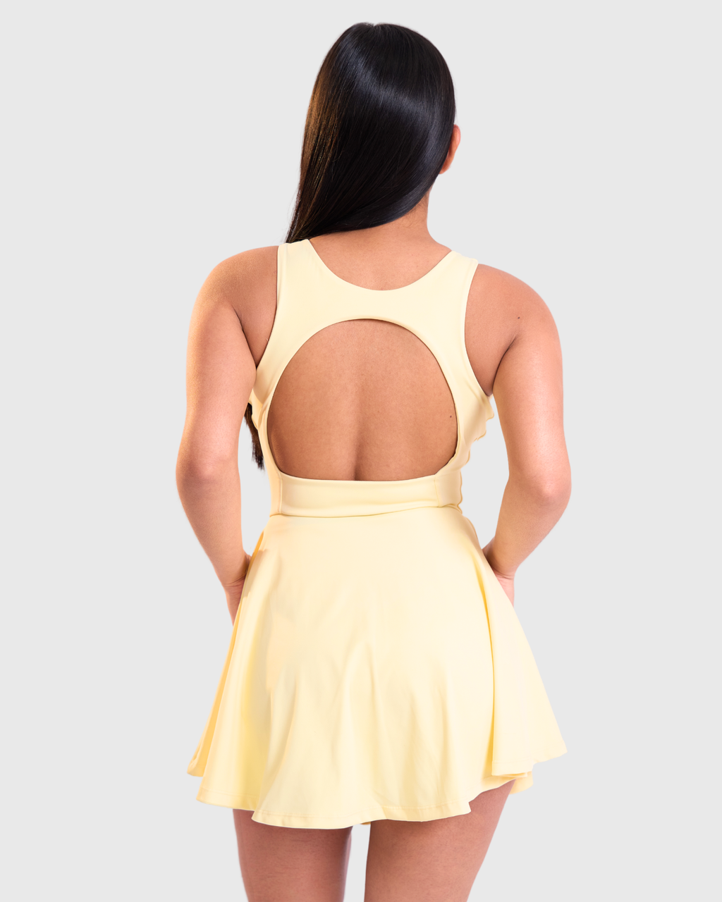 Court Flow Set in Pastel Yellow, back view showing open-back cutout