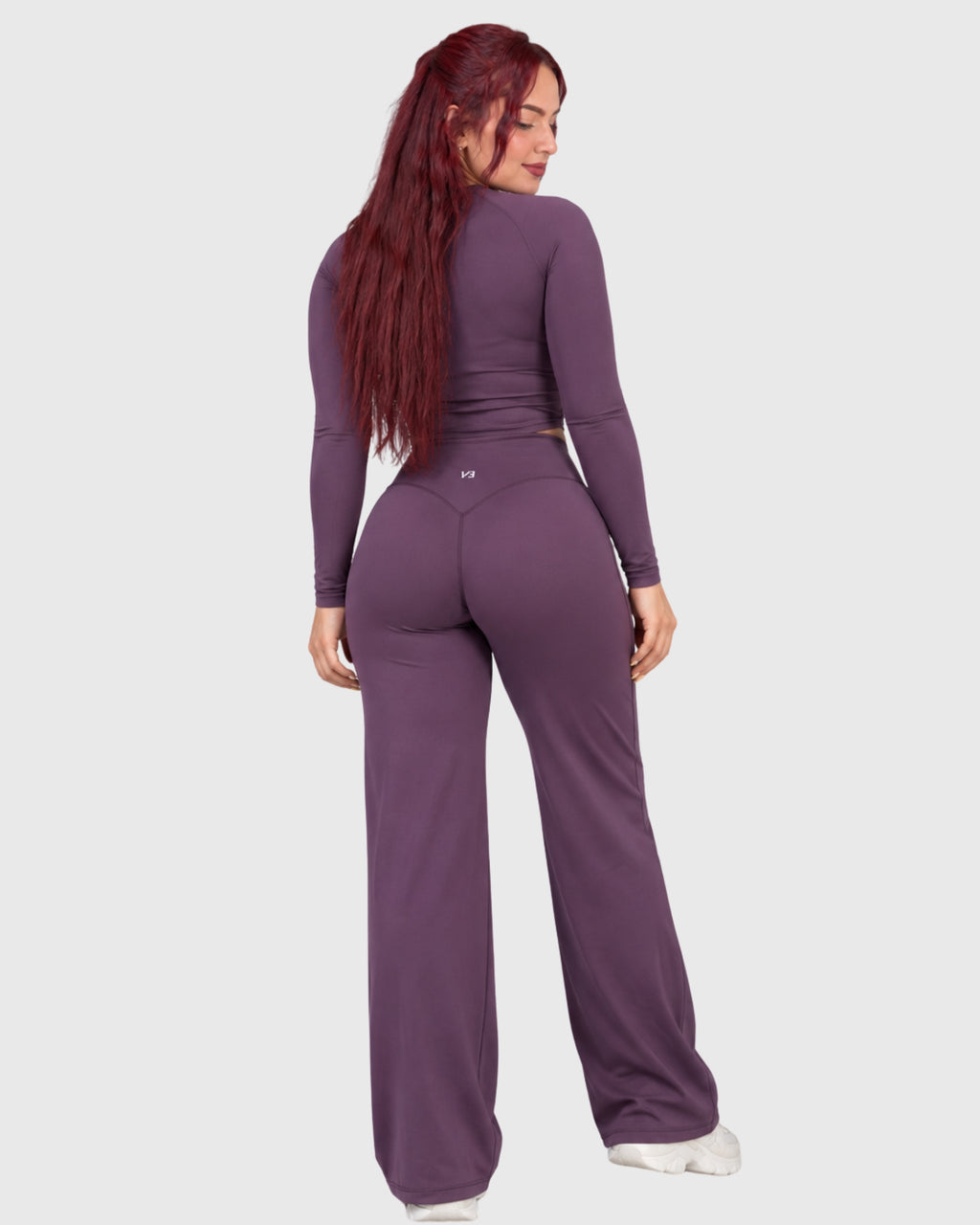 Stella Set in Plum Purple, back view of long-sleeve top and flared pants