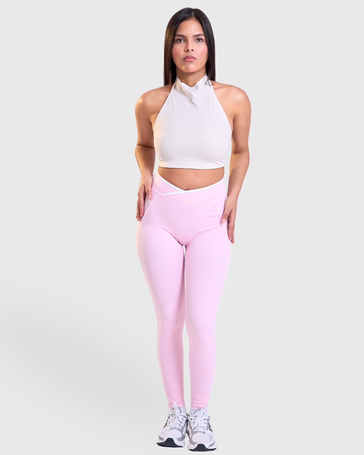 Sculpt Leggings in Pastel Pink, full-body front view with crossover waistband