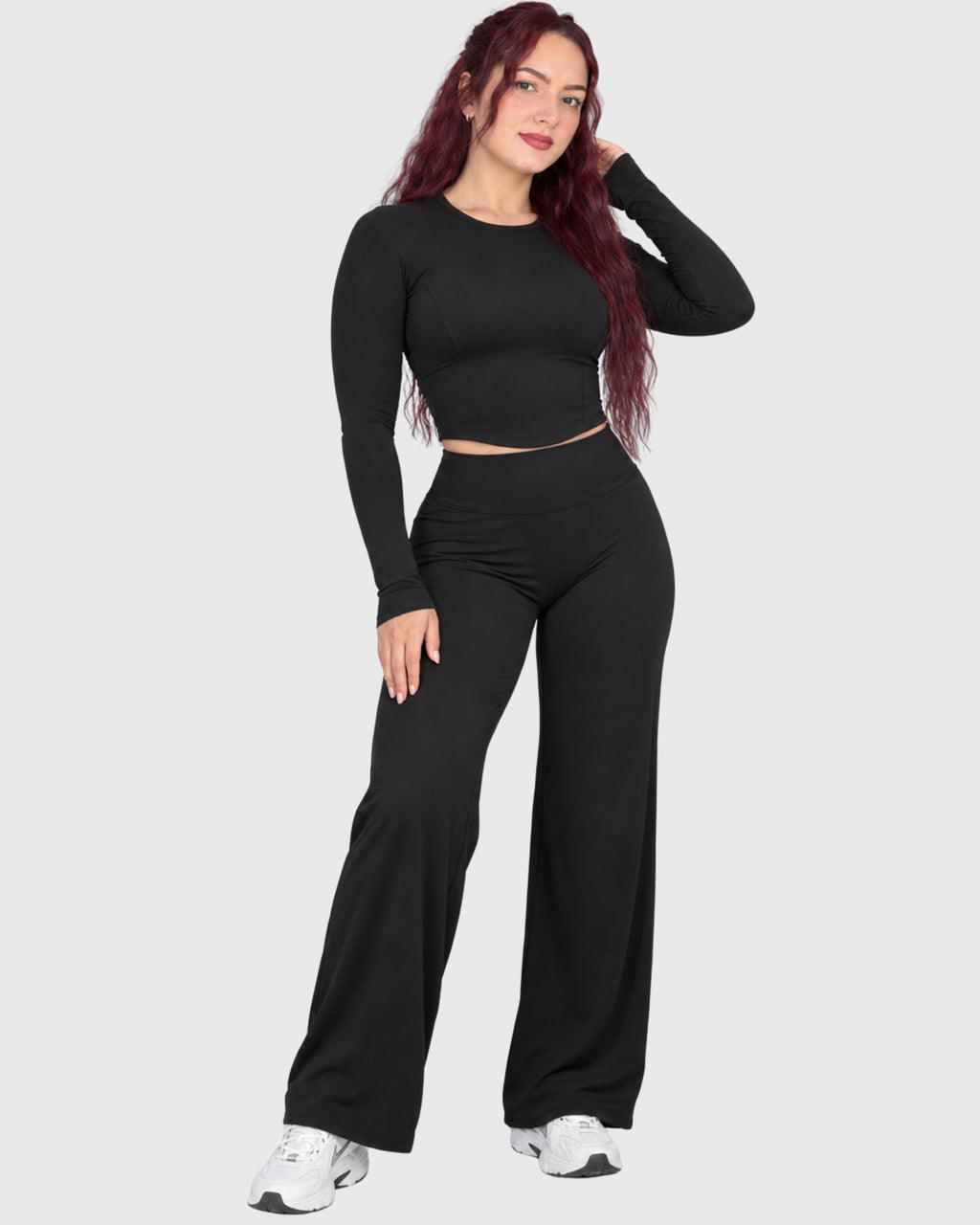 Stella Set in Black, front view of long-sleeve crop top and flared pants
