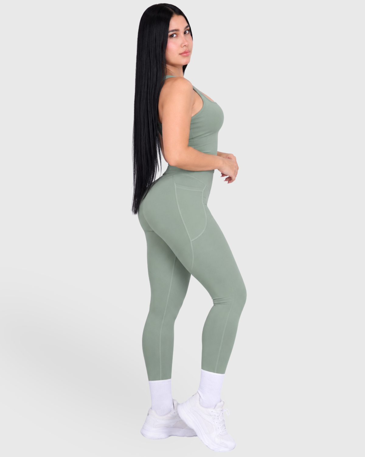 Poise Set in Green, full-body side view of tank top and leggings