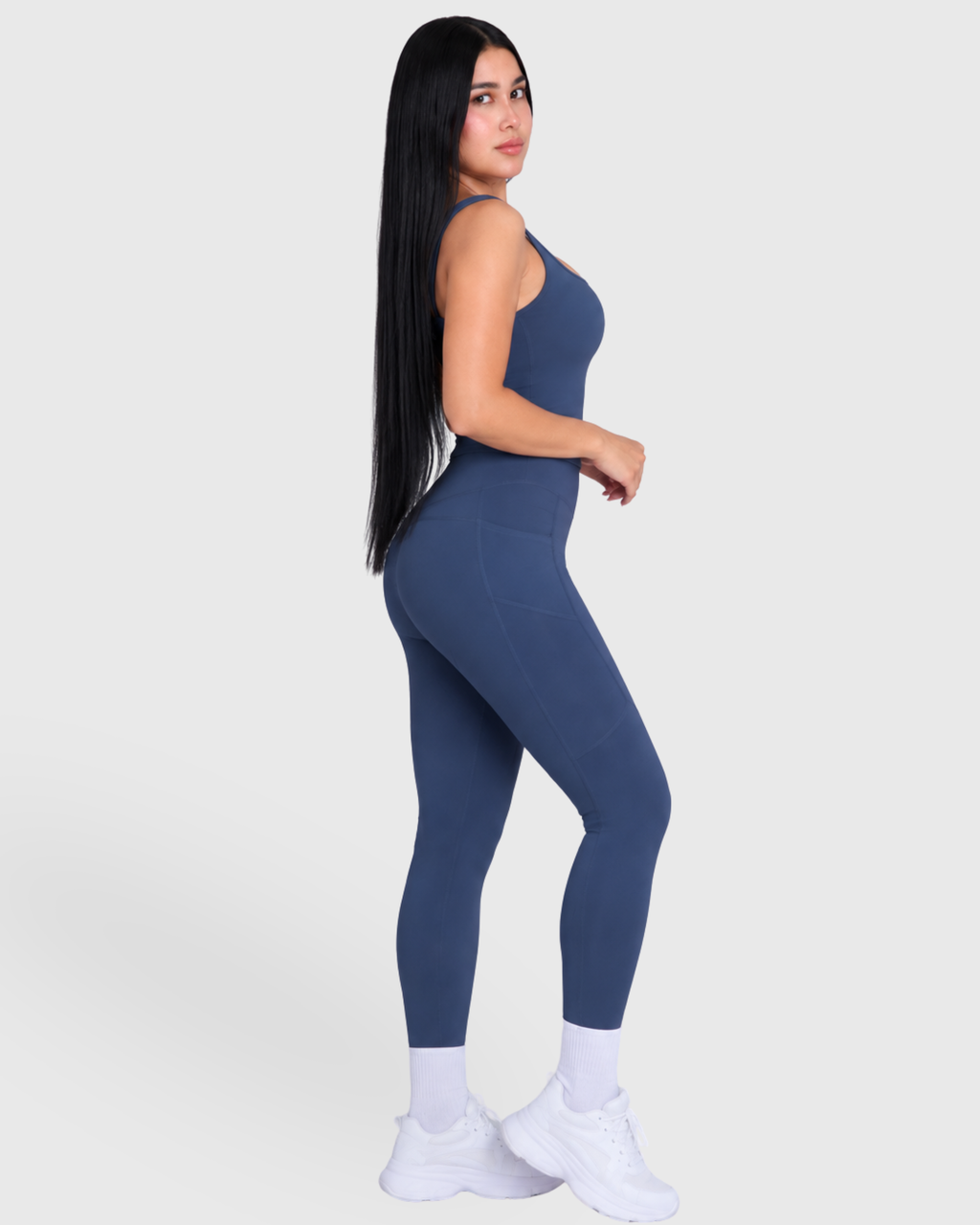 Poise Set in Navy, full-body side view of tank top and leggings