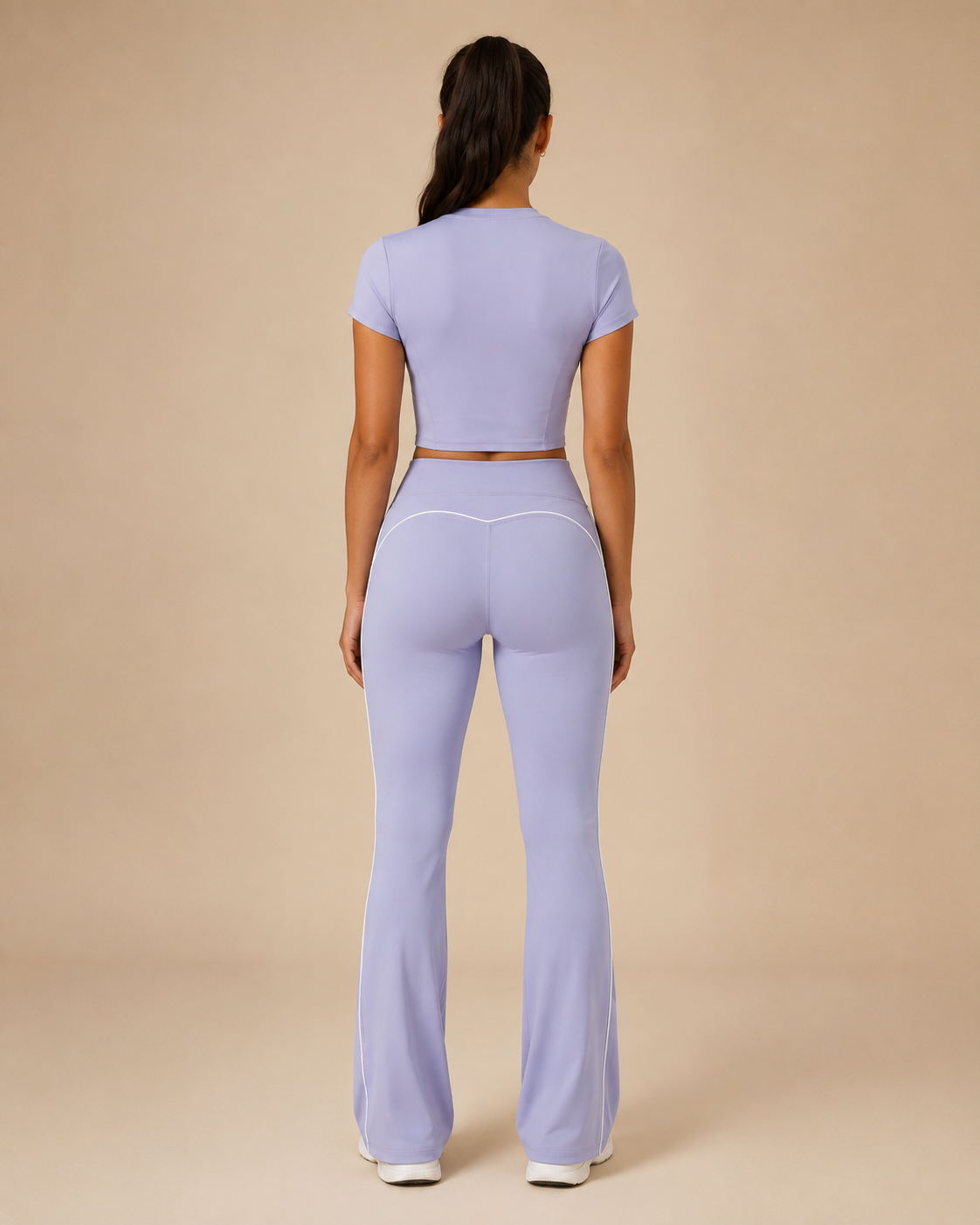 Balance Set in Purple, full-length back view of cropped tee and flared leggings
