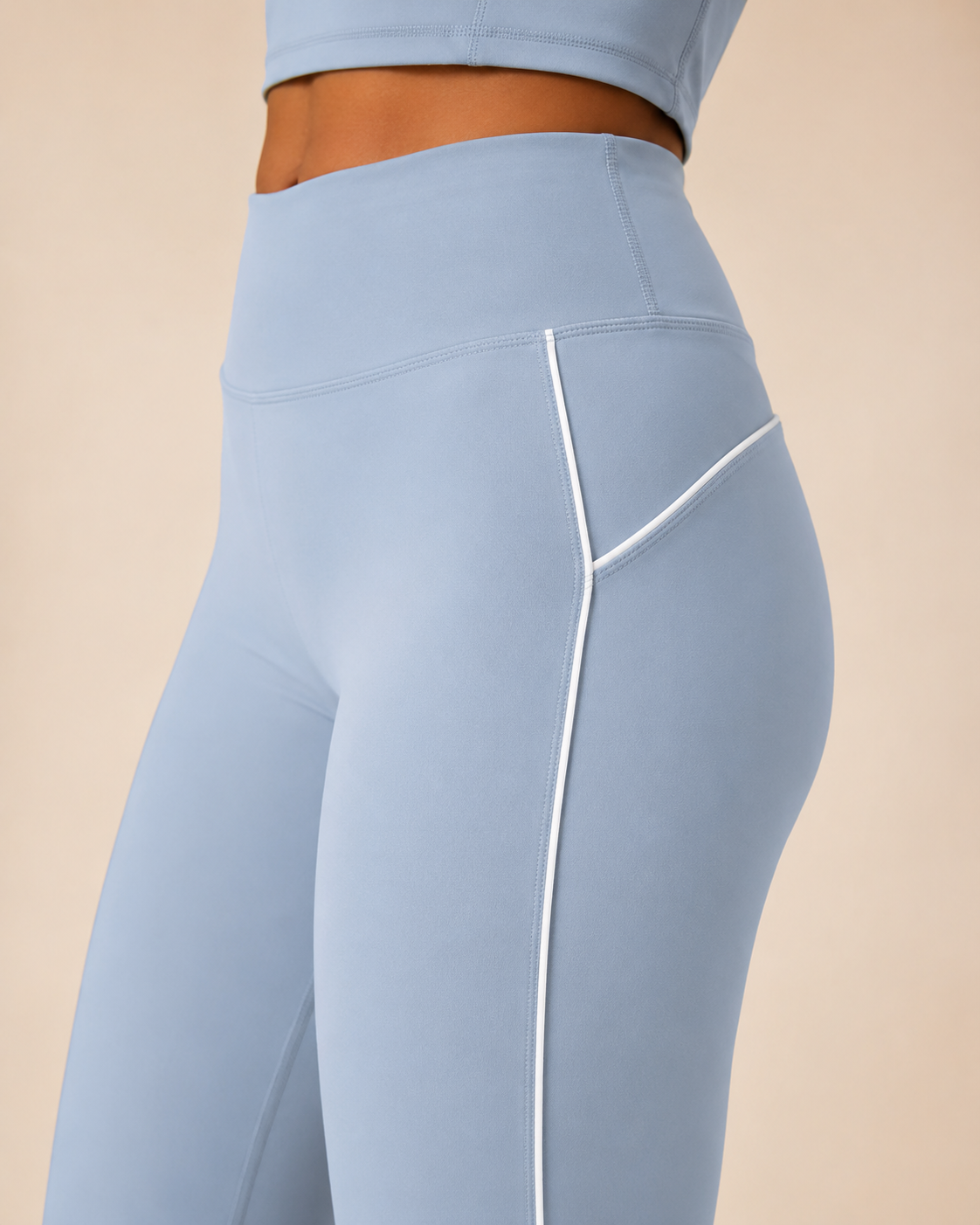 Balance Set in Sky Blue, close-up of high waistband and white contrast piping