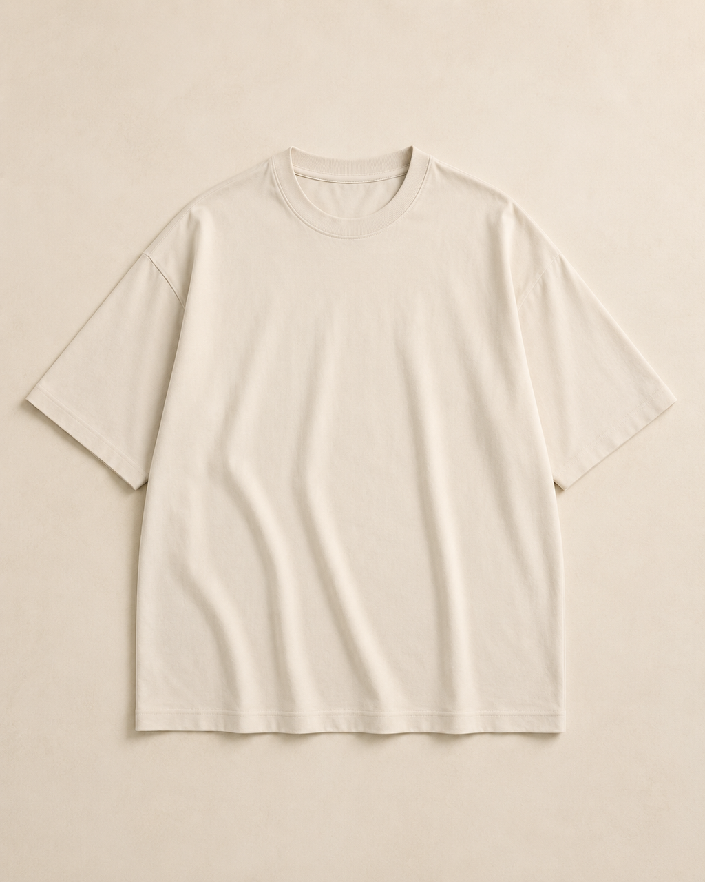 Oversized Tee in a light neutral shade, flat lay front view